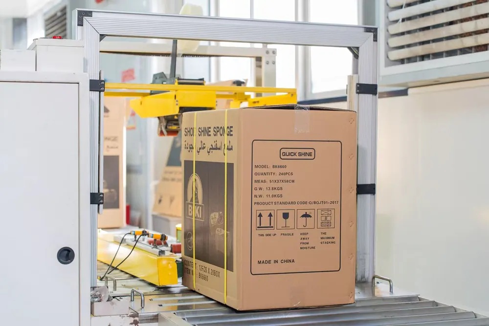 Cleaning product packaging line during bottle labeling