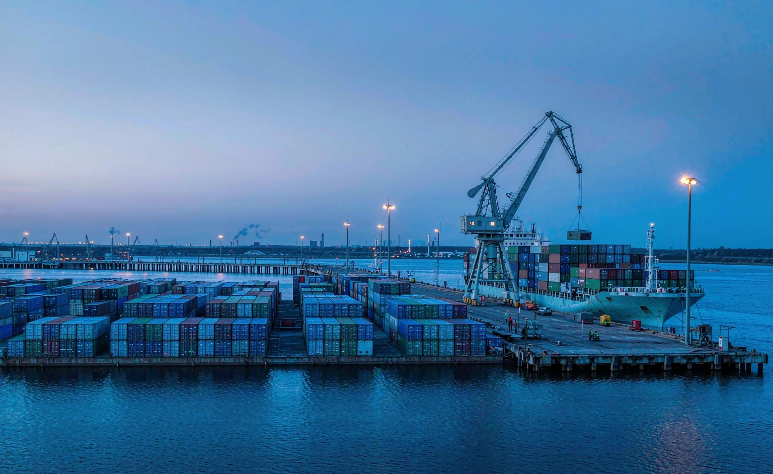 A container vessel being loaded at a terminal for a Middle East route serving Jebel Ali