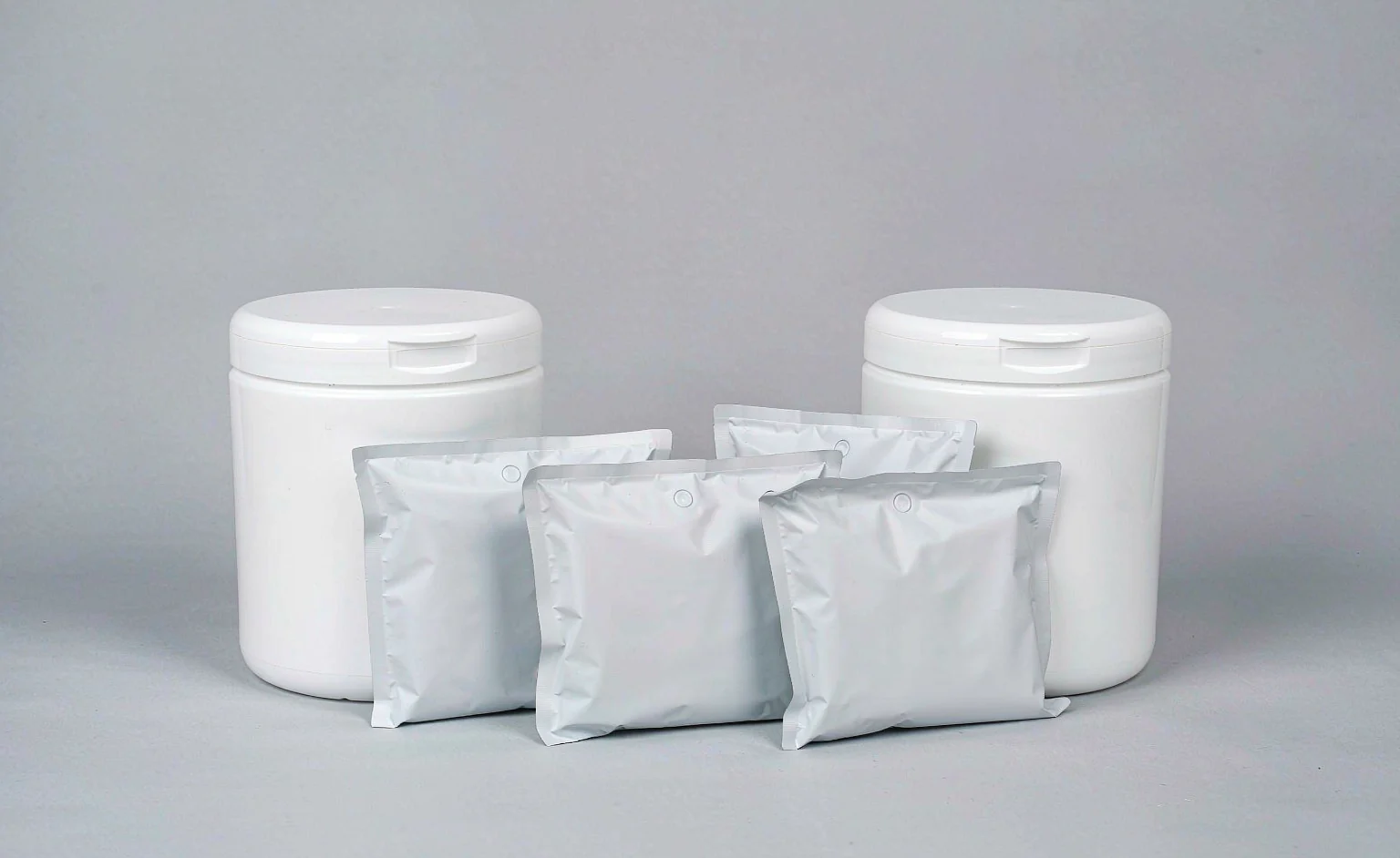 Private label cleaning wipes range with unlabeled canisters and soft packs