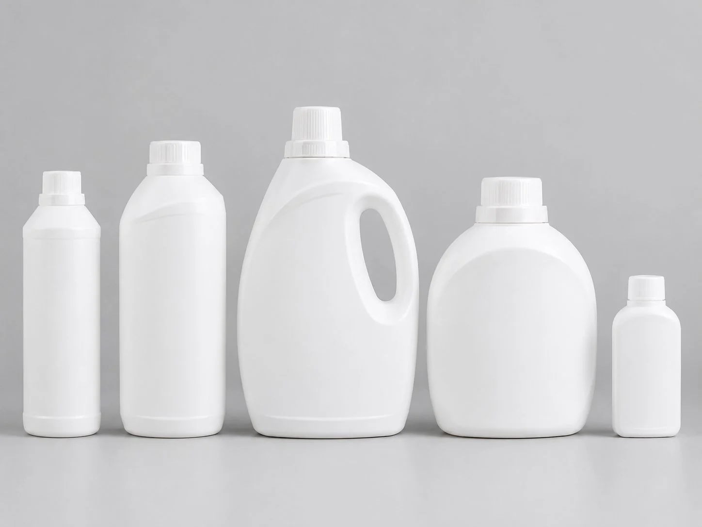 Five unlabeled laundry liquid bottle formats for private label OEM ranges